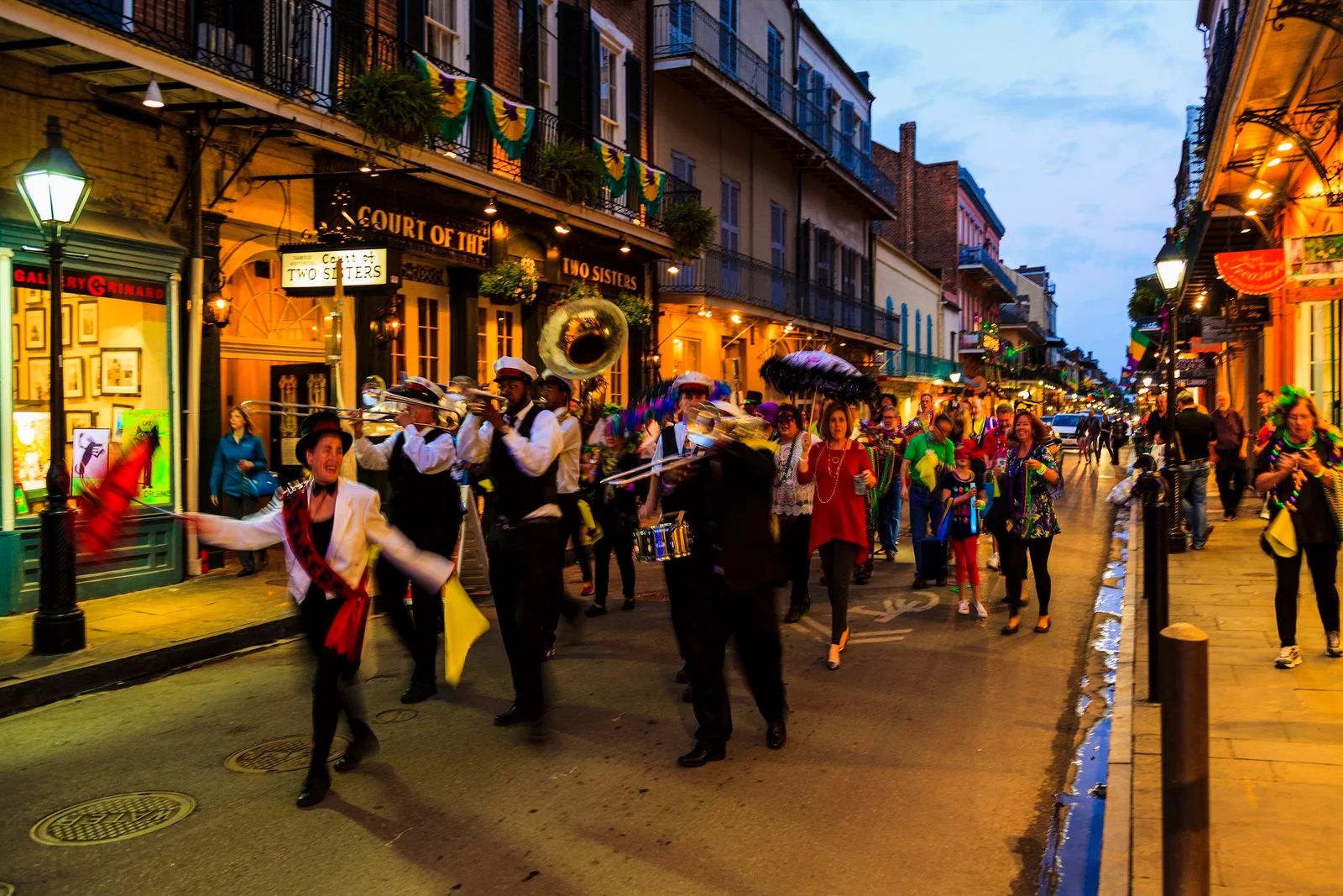 New Orleans, LA/USA  Jan 12, 2019: Marching band and many  people playing music and dancing at French Quarter, New Orleans, Louisiana